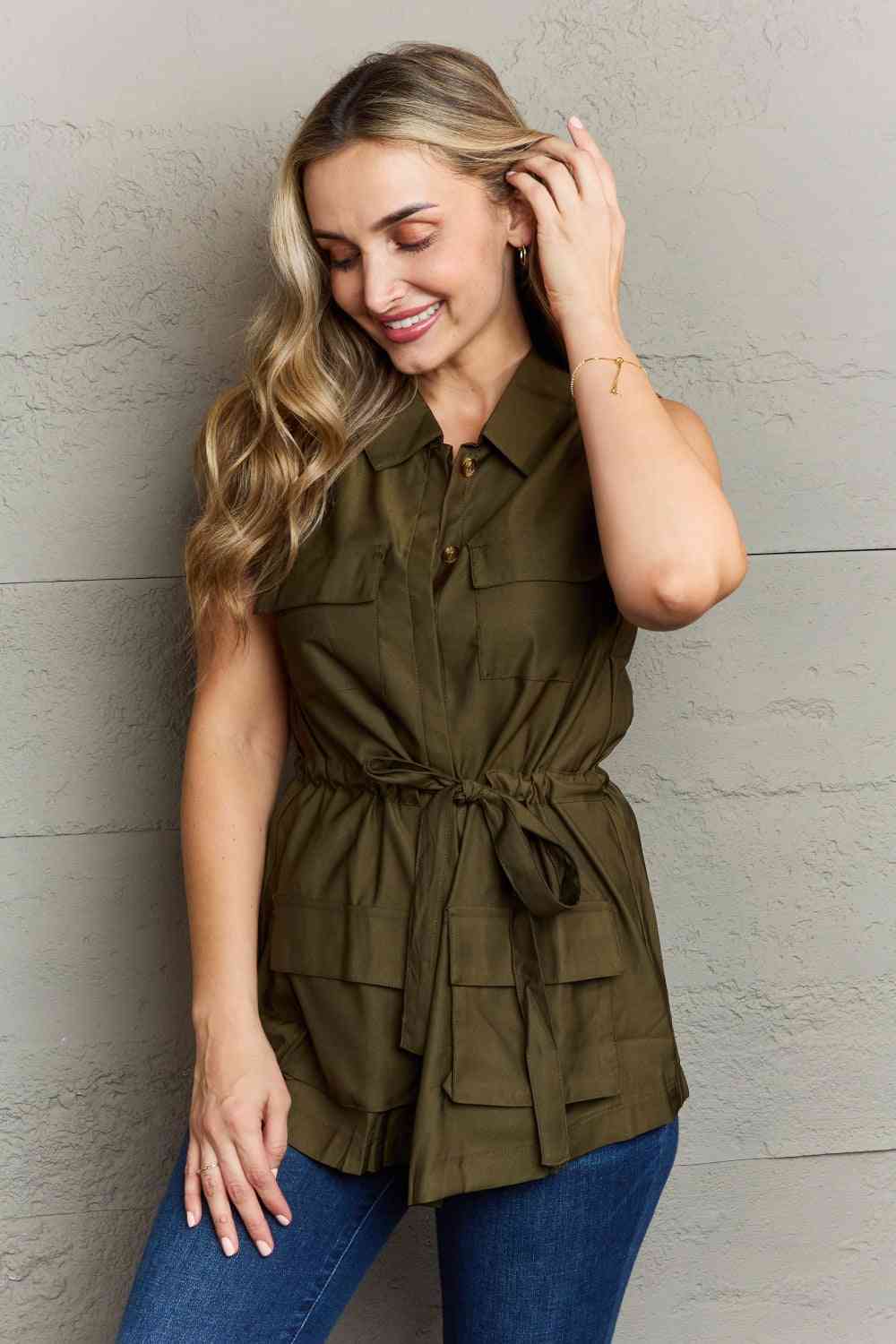 The Light Sleeveless Collared Button Down