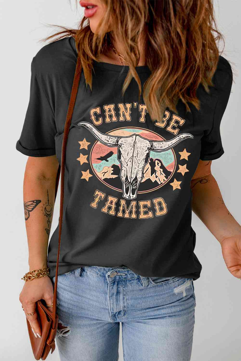 CAN'T BE TAMED Graphic Tee